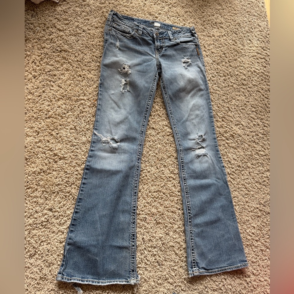 Silver Jeans Light Blue Distressed Flare Jeans